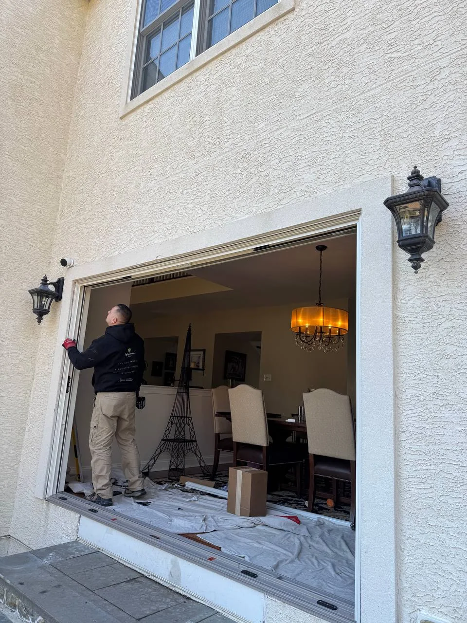 Window installer working on a project