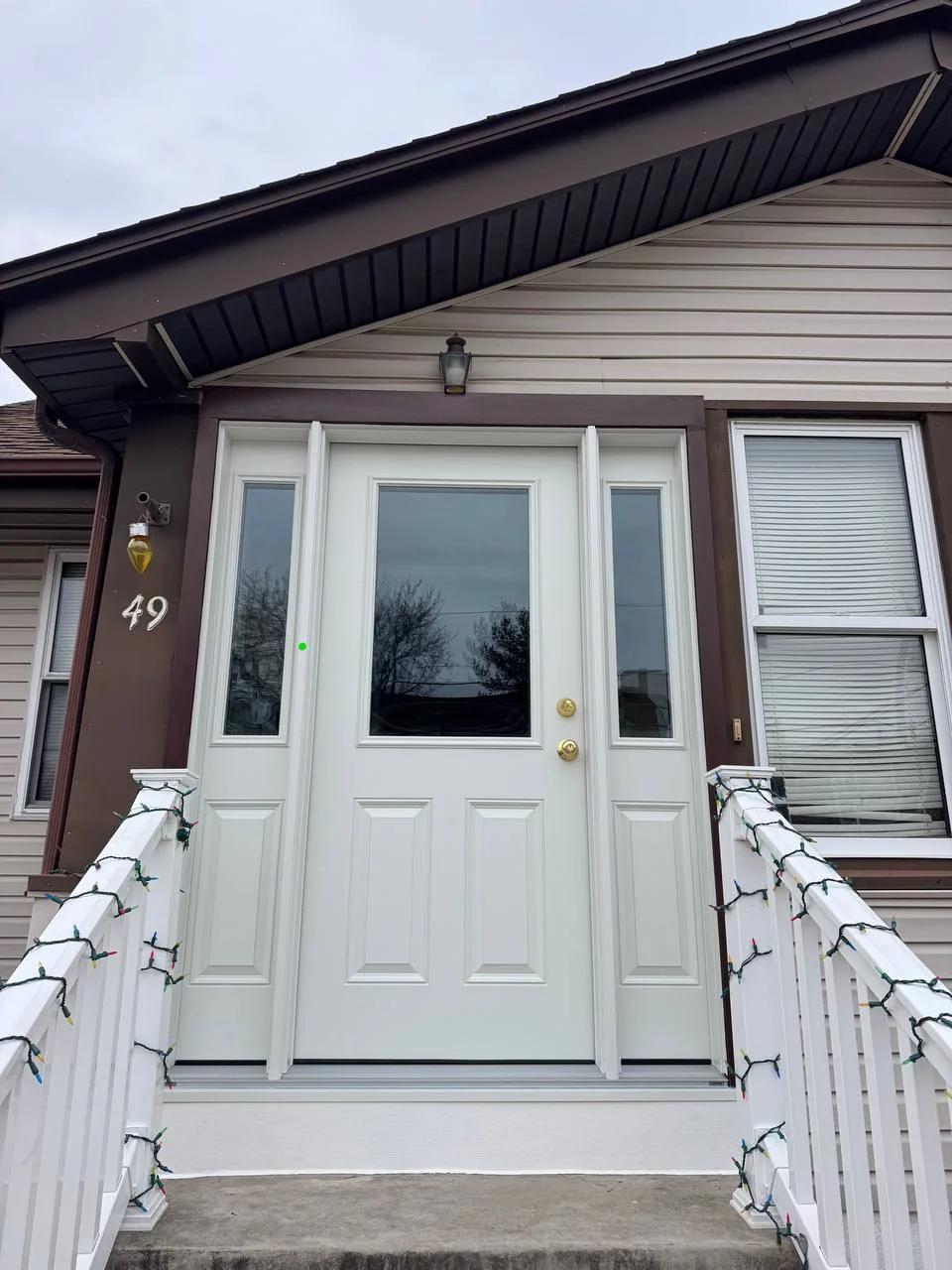 Black entry door installation